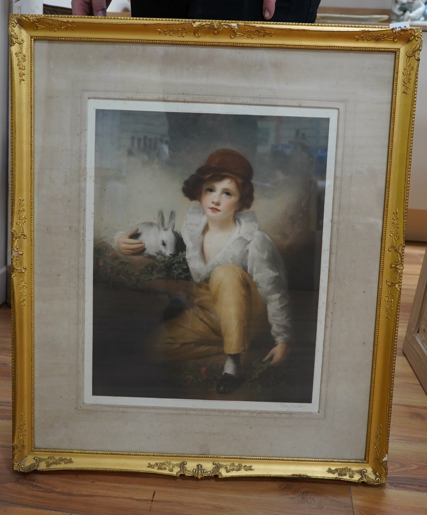 After Sir Henry Raeburn RA (Scottish, 1756-1823), mezzotint, 'The Boy with Rabbit', printed in colour by hand by N Jowett, published by Frost and Reed, 1923, signed in pencil, 50 x 39cm, gilt framed. Condition - poor